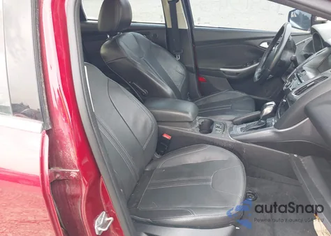 2014 Ford Focus Titanium from USA, damaged, VIN 1FADP3J23EL233249